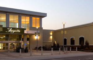 sunset picture of the main entrance to fayette mall