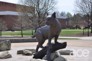 Jim Beam: a statue of a wildcat perched on a rock